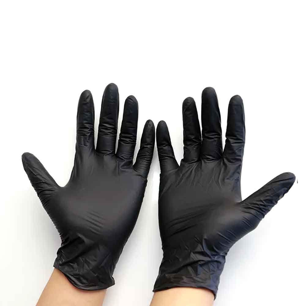 Close-up of hands wearing black nitrile exam gloves, offering durable, powder-free protection for medical, industrial, and tattoo use.