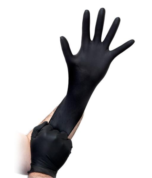 A pair of black nitrile exam gloves being stretched to showcase flexibility, durability, and puncture resistance.